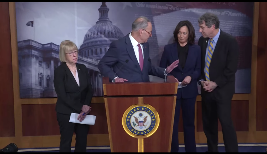 Chuck Schumer side-eyes Kamala Harris for giggling during impeachment press conference